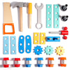 A collection of wooden tools and shapes including a hammer, screwdriver, wrench, and various matching blocks and fasteners.