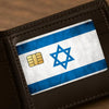 A close-up of a dark brown leather card holder featuring an Israel flag design.