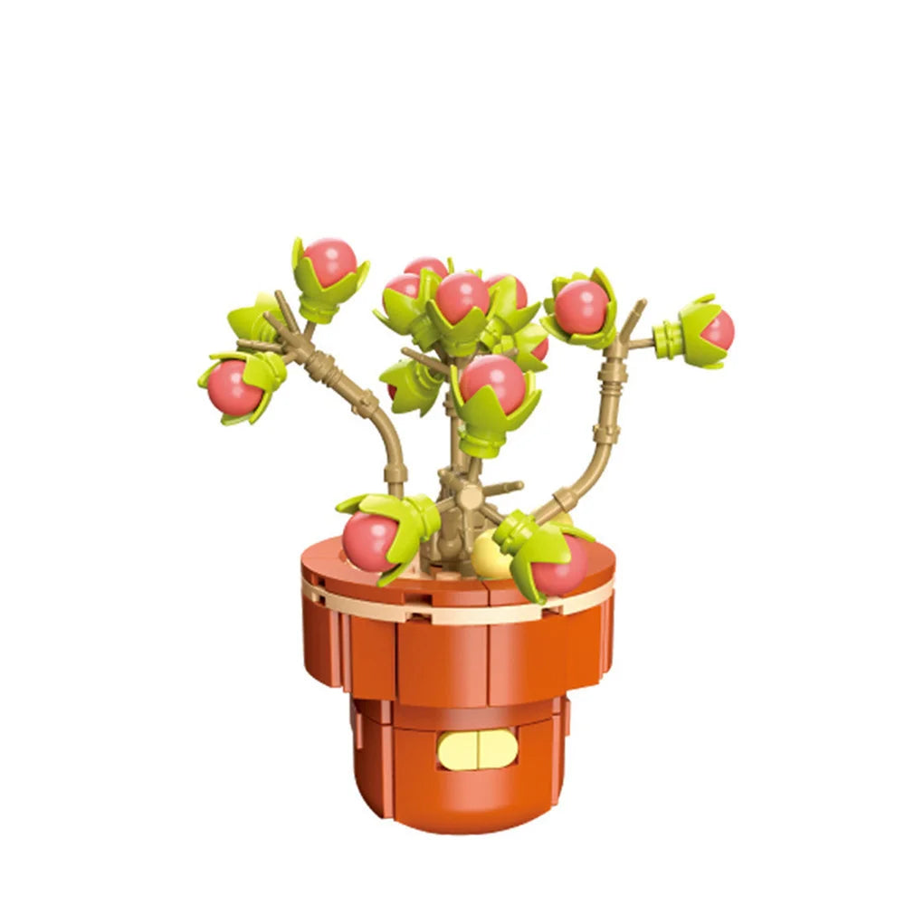A set of green and pink fruit-bearing branches and leaves made of building blocks.