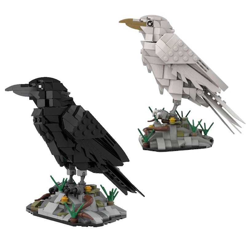 Two bird models, one black and one white, are displayed on building block bases.