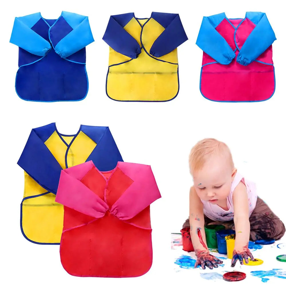 A set of colorful waterproof kids art and baking aprons with long sleeves shown in various shades of blue, yellow, and pink.