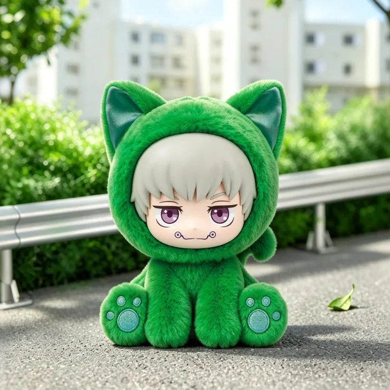 A plush collectible figure of a green cat-like character with white hair sitting on a gray outdoor surface.