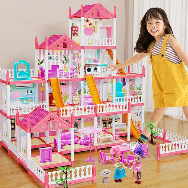 A child stands next to a pink and white miniature castle and villa playset featuring colorful structures and figures.