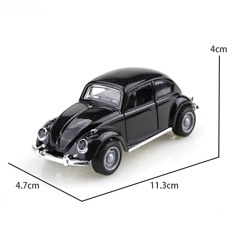 A black 1:38 die-cast model of a classic Beetle car shown from the side.