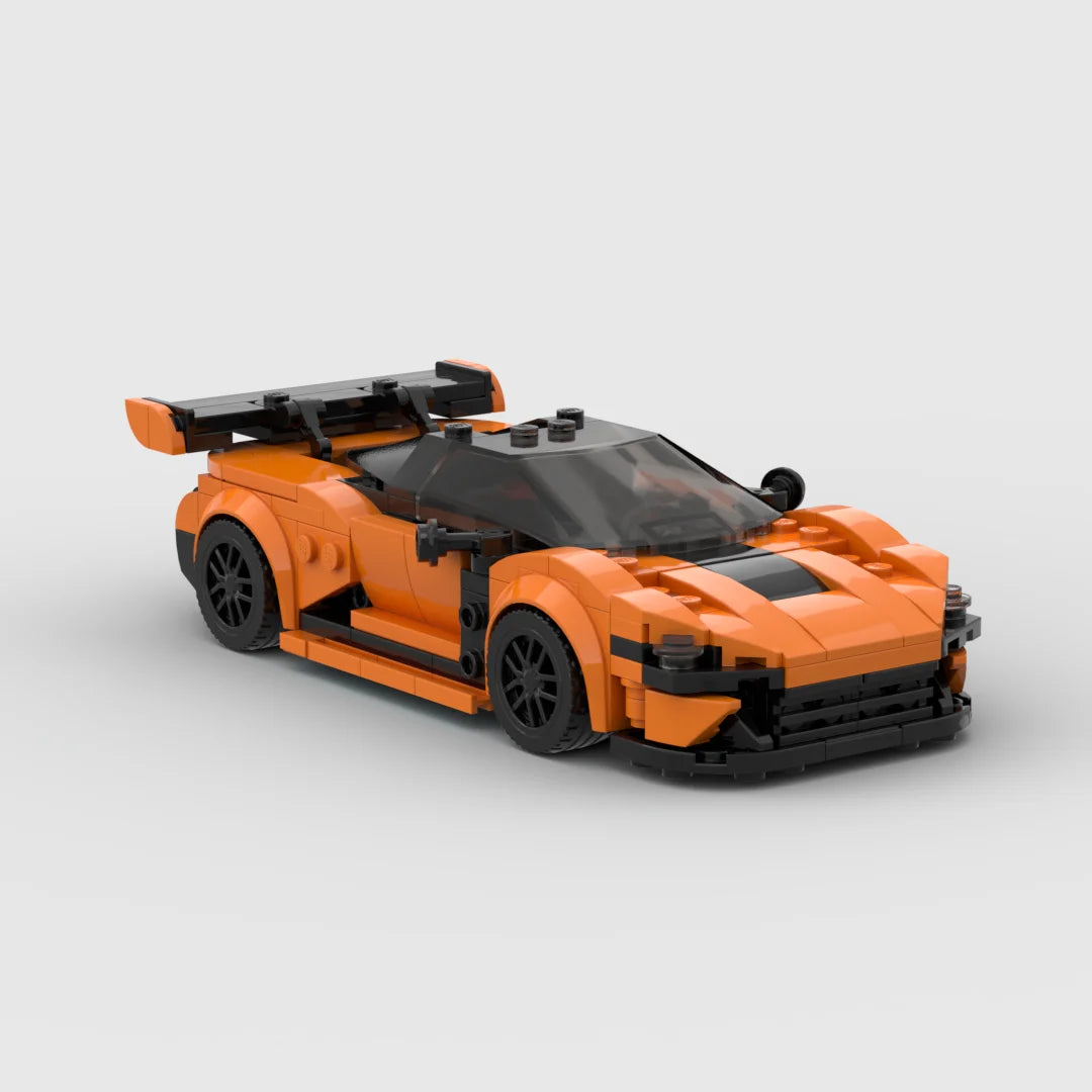 An orange classic supercar model built from building blocks.