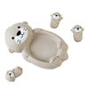 A set of light beige silicone animal washing water toys including a bear and a lion head.