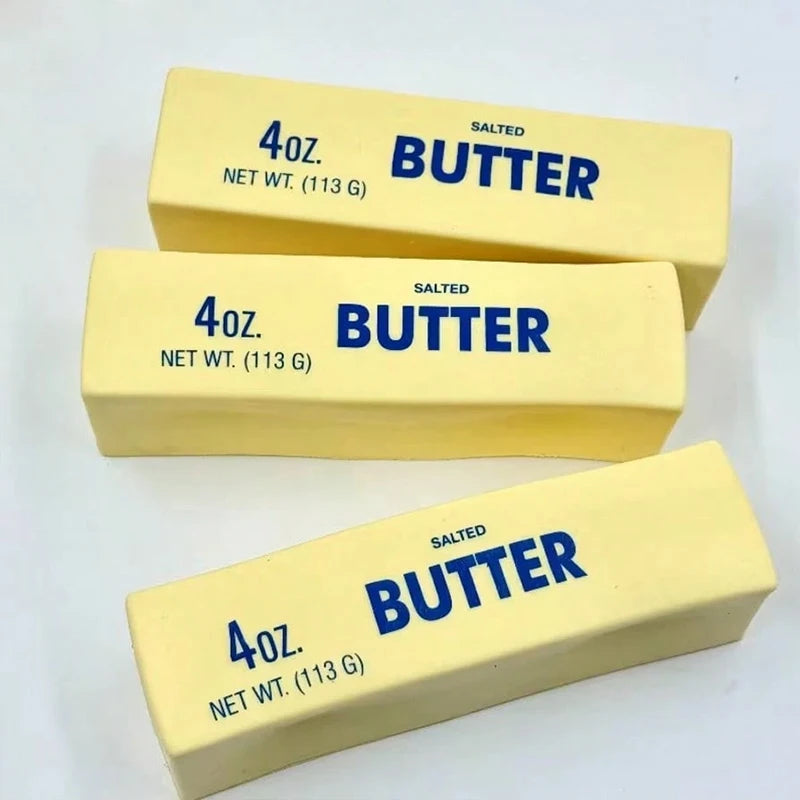 Three yellow butter sticks labeled 4oz salted butter with net weight 113g