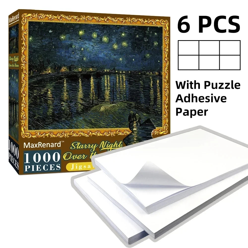 Box of a 1000-piece starry night jigsaw puzzle with adhesive paper and six puzzle pieces