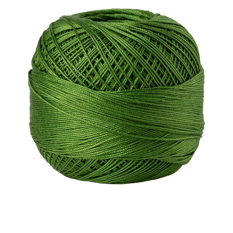 A ball of bright green 100% cotton crochet thread used for tatting and embroidery.