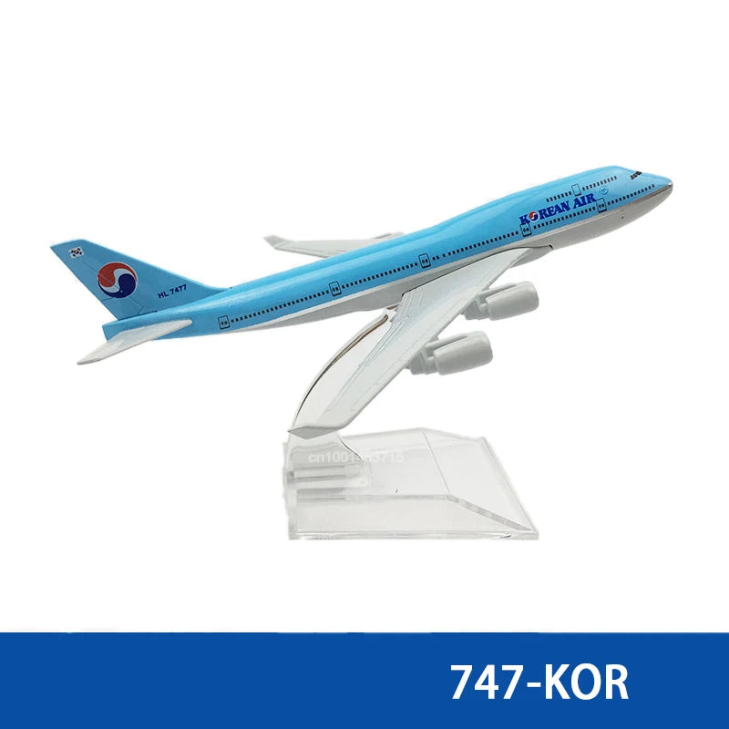 Diecast model of a Korean Air Boeing airplane in blue and white paint.