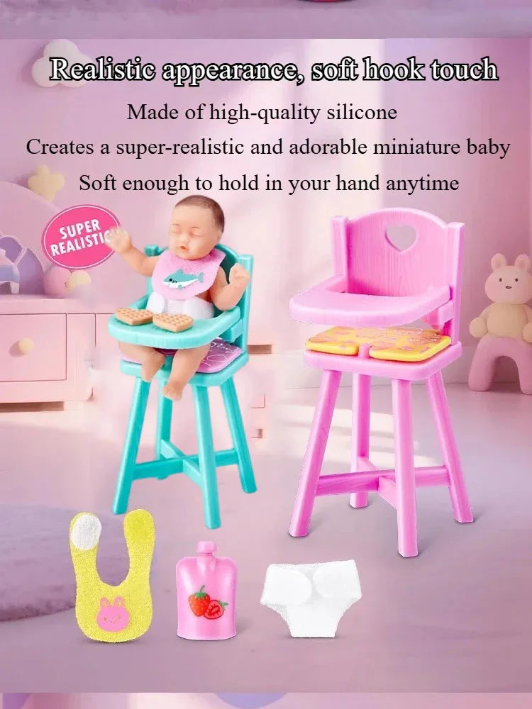 A pink miniature baby doll is shown in a light blue chair with accessories on a purple surface.