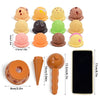 A set of pretend play ice cream stacking toys in various colors and shapes, including a large orange cone and a smartphone-sh