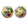 Pair of round silicone beads with floral patterns in yellow, pink, and blue tones