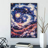 A square diamond painting featuring a night starry sky scenery with deep blues, purples, and glowing yellow light.