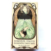 A box of the Ethereal Visions Illuminated Tarot deck by Matt Hughes featuring an illustration of a woman with a crescent moon