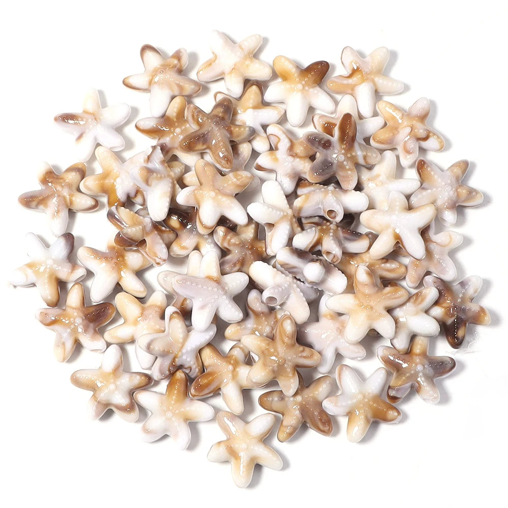 A variety pack of acrylic beads shaped like starfish, conch, and turtle in natural beige and white colors.