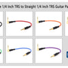 A set of five 1/4 inch TRS guitar patch cables showing various colors and right-angle connectors.