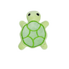 A small, light green plush toy shaped like a turtle with a textured shell.