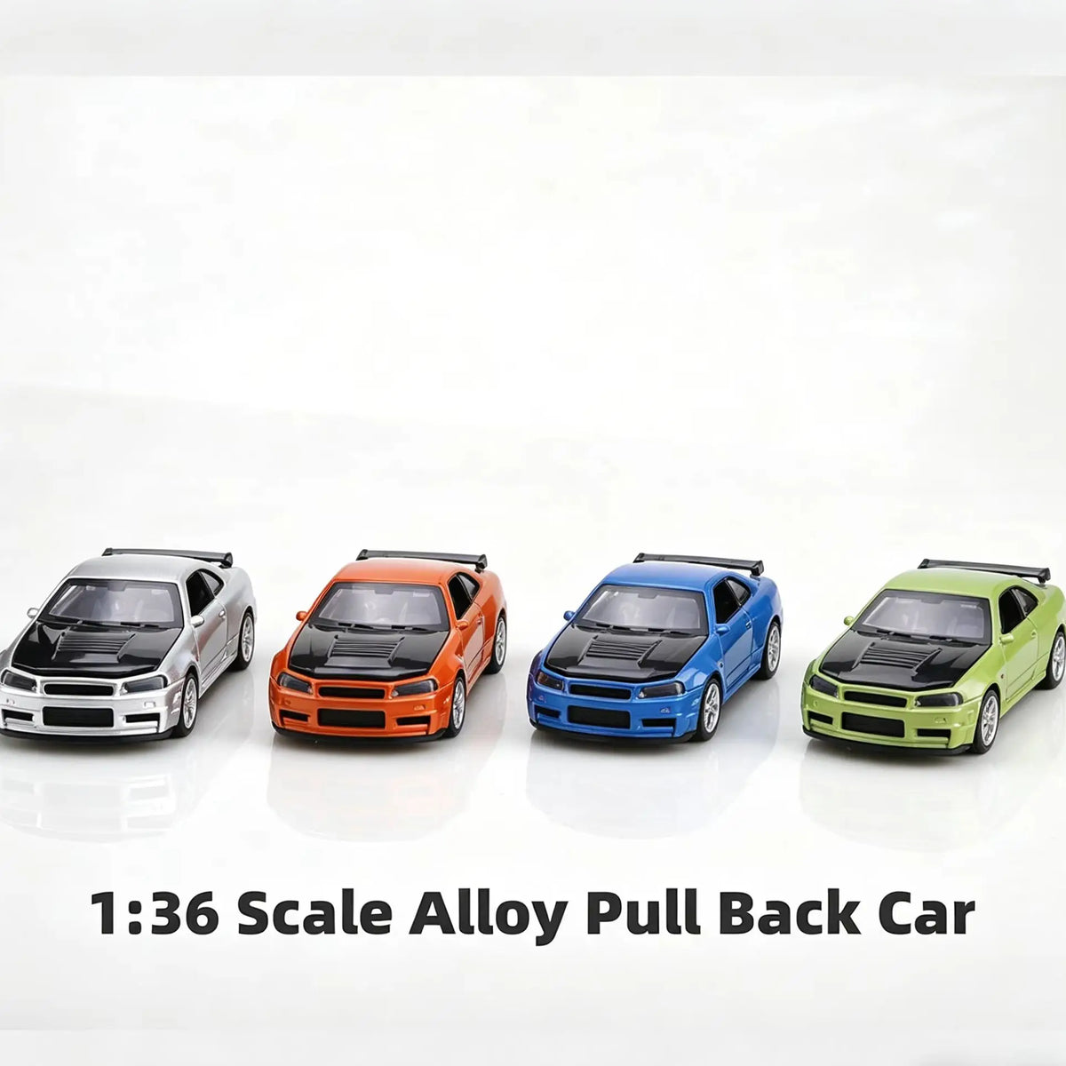A collection of four die-cast pull-back cars in various colors, including silver, orange, blue, and green.