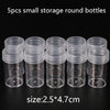 Five small clear plastic storage round bottles with a size of 2.5x4.7 cm
