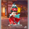 A collectible PVC figurine of a character with red and white armor and green hair, standing on a clear base.