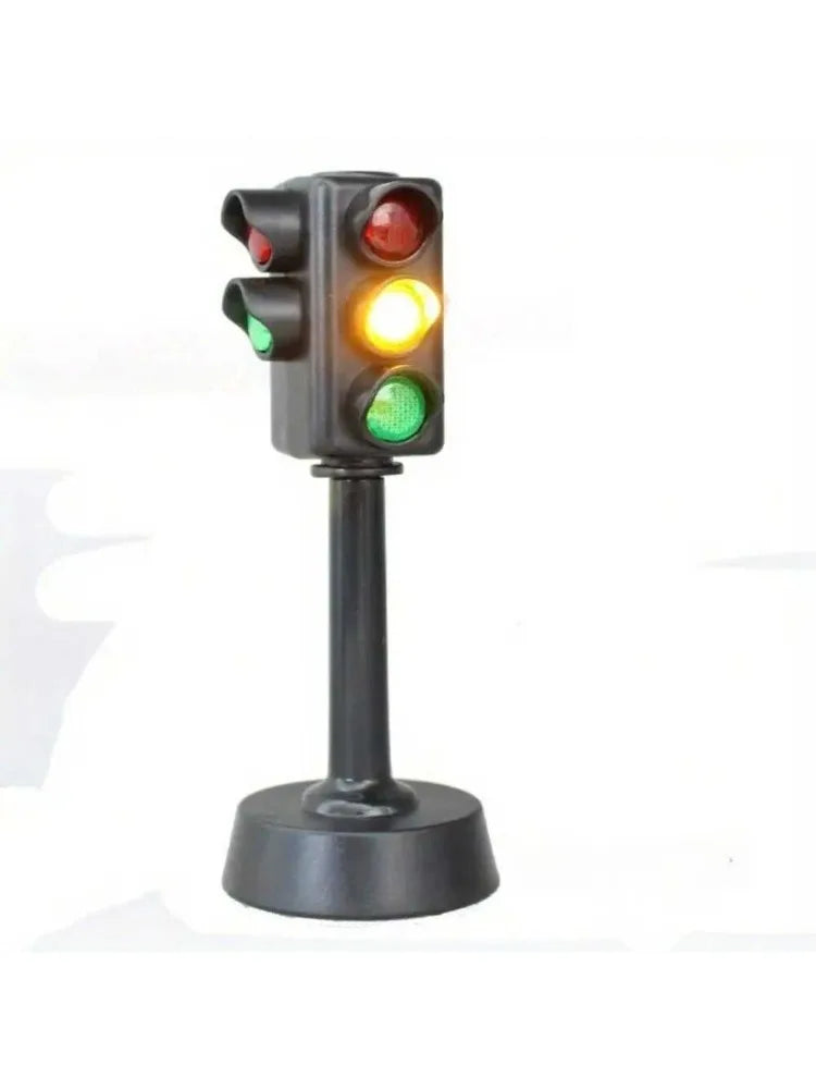 A black mini traffic light puzzle with three colored lights: red, yellow, and green.
