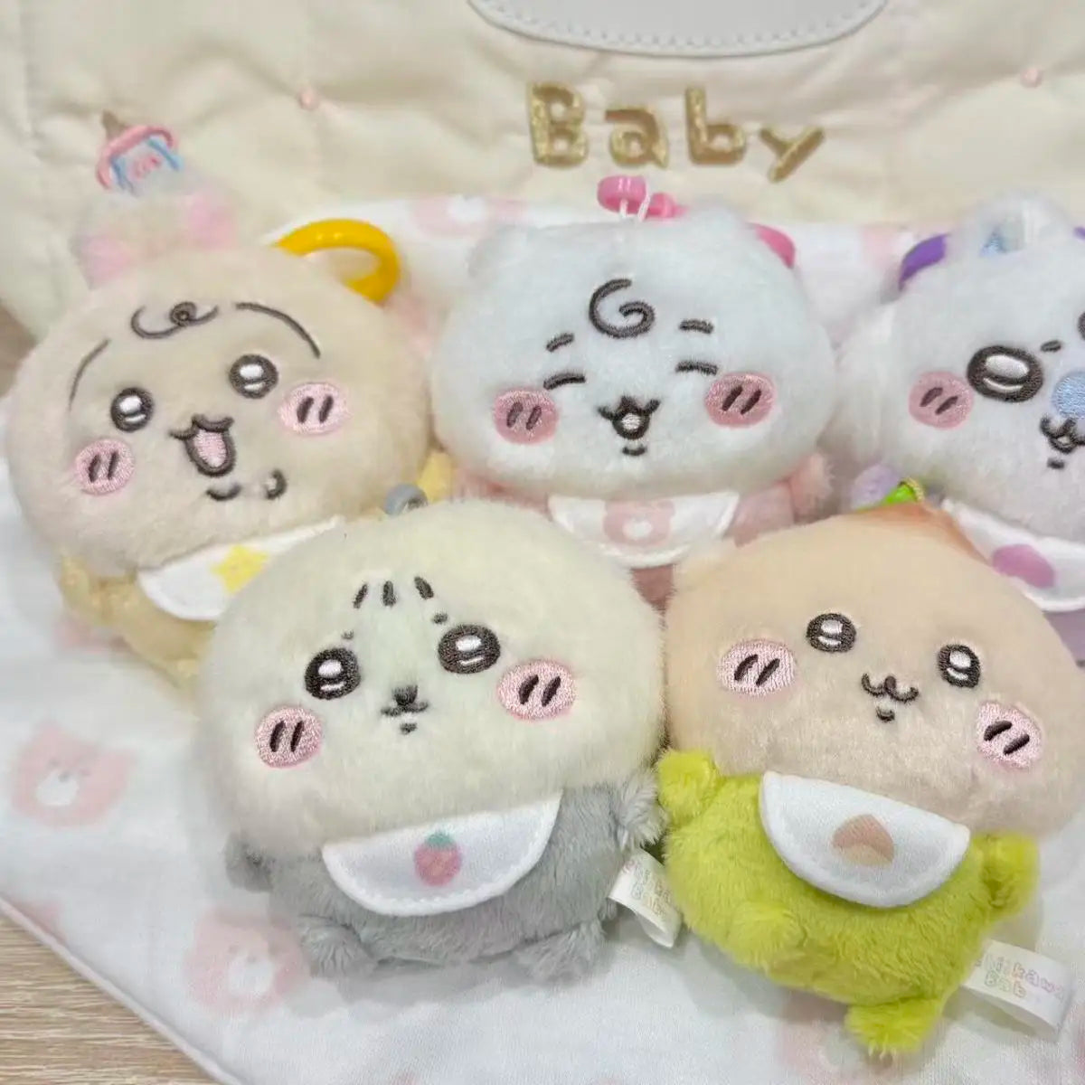 A set of three fluffy white and pink kawaii plush toys featuring characters like Usagi, Hachiware, and JiYi.