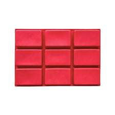 A red silicone mold with nine cavities for making soaps, candles, and crafts.
