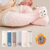 A set of plush pink and white baby knee-high socks with animal faces, shown next to a representation of the coral velvet mate