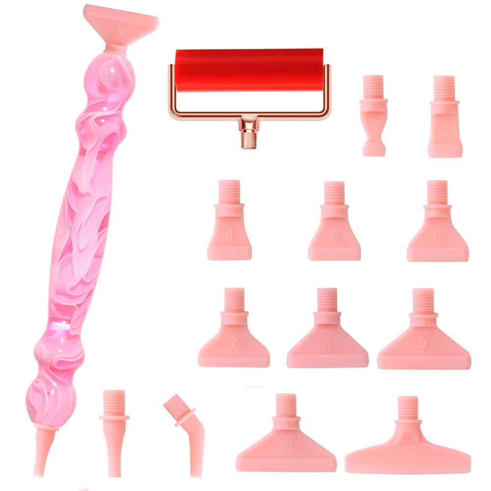 A pink Diamond Art pen kit showing a main body and twelve interchangeable tips.