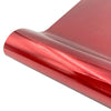 A close-up view of a roll of red glitter holographic heat transfer vinyl.
