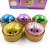 A collection of glitter unicorn squishy toys in various colors and shapes displayed in cardboard cups.