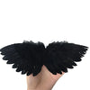 A pair of black mini feather angel wings displayed against a white background.