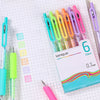 A pack of six colorful retractable gel pens with 0.7mm tips displayed on a grid paper background.