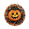 A detailed diamond painting hanging ornament kit featuring a carved pumpkin design with sparkling gold and orange elements.