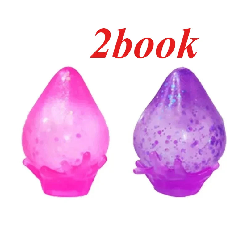 Two squishy toys, one pink and one purple, with glitter texture.