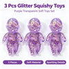 A set of three purple transparent soft squishy toys for stress relief