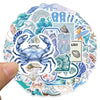 A circular sticker pack featuring various ocean-themed crabs, shrimp, and sea creatures in blue and teal colors.