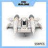 A white Starfighter model kit built from 558 pieces of LEGO bricks.