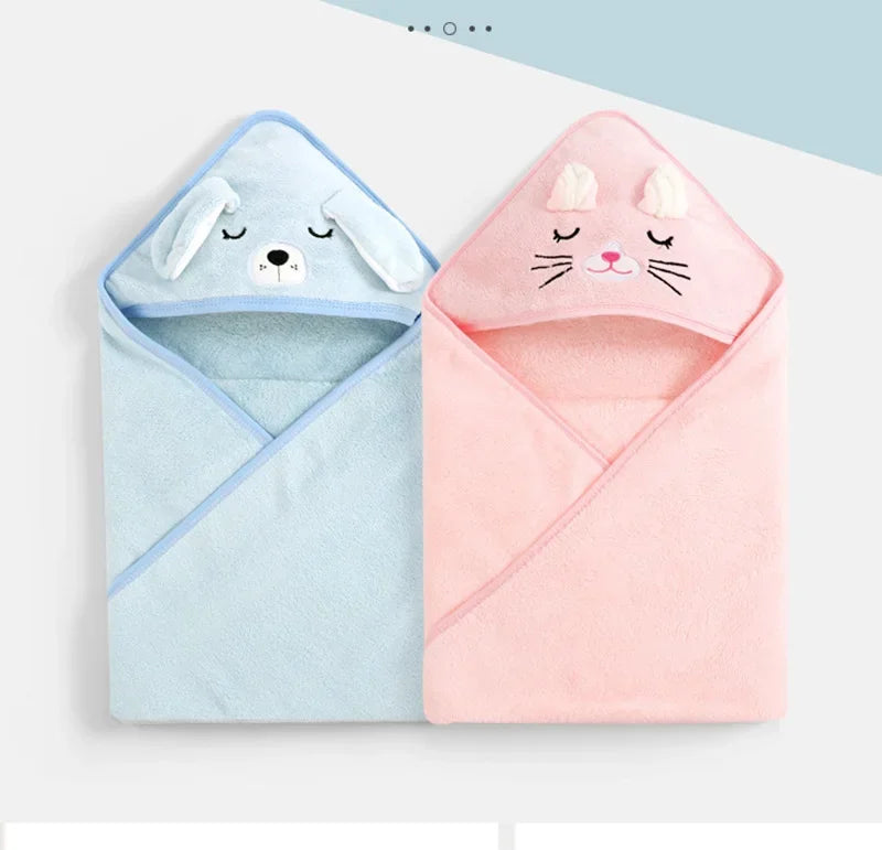 A pair of adorable hooded animal bath towels, one blue dog and one pink cat, for babies and toddlers.