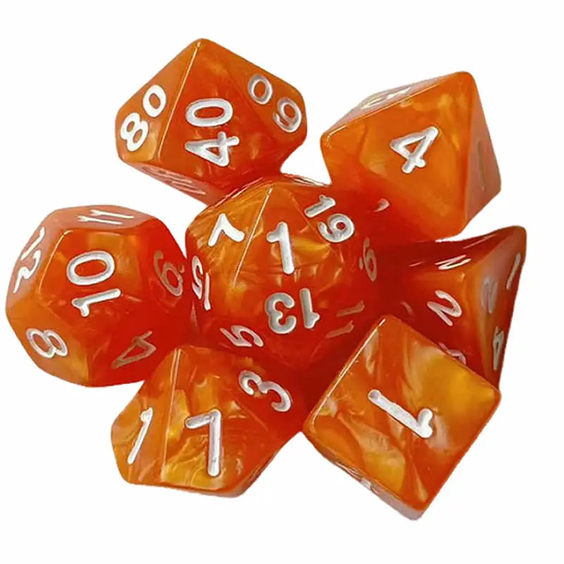 A set of seven polyhedral dice in various orange and translucent colors.