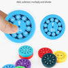 A hand is holding a blue math fidget spinner toy with various colored spinners and educational numbers.