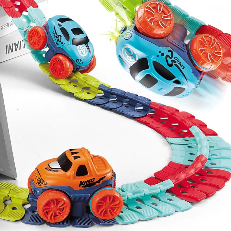 A colorful flexible anti-gravity race car track set with LED cars and various colored plastic pieces.