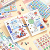 A collection of kawaii cartoon stickers and writable notes for DIY scrapbooking laid out on a light background.