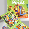 A green puzzle box and an open puzzle showing a train scene with colorful pieces.