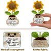 Handmade crochet sunflower pot doll with yellow petals and green leaves