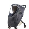 A dark gray quilted stroller cover with a transparent window and black straps.