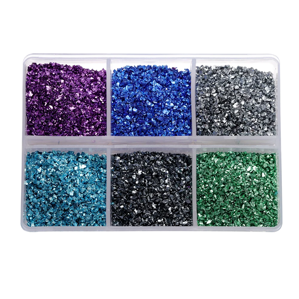 A clear plastic container filled with various colors of crushed glass stones for resin and craft projects.