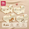 A pack of four soft cotton gauze baby bandana bibs with various cute animal patterns for burping and feeding.