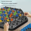 A close-up of a black puzzle board game with plastic triangle pieces being inserted to form triangles.